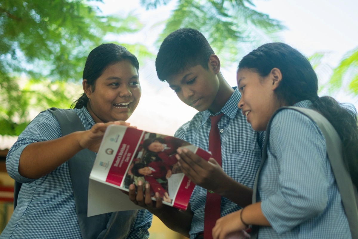 Students in Arunachal Pradesh reading together